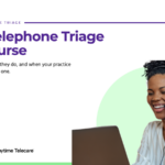 Telephone triage nurse wearing a headset assisting a patient by phone at a laptop