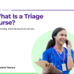 Registered triage nurse in blue scrubs taking a patient call while holding a clipboard