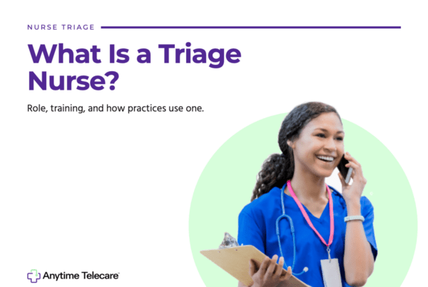 Registered triage nurse in blue scrubs taking a patient call while holding a clipboard